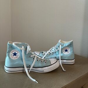 Baby blue Converse trainers